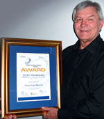 The CEO of Water Angel, Hennie Stander, with the award
